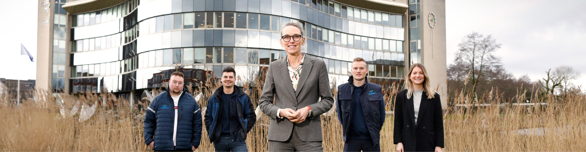 Dijkgraaf met collega's voor waterschapshuis